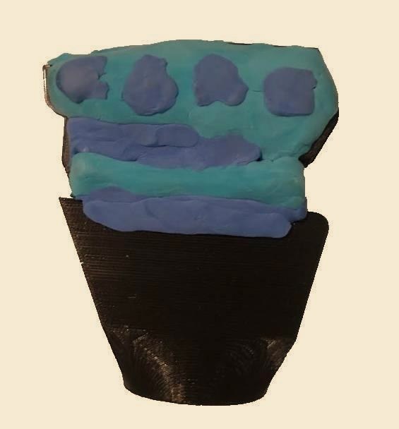 A printed palm reshaped in air-dry clay